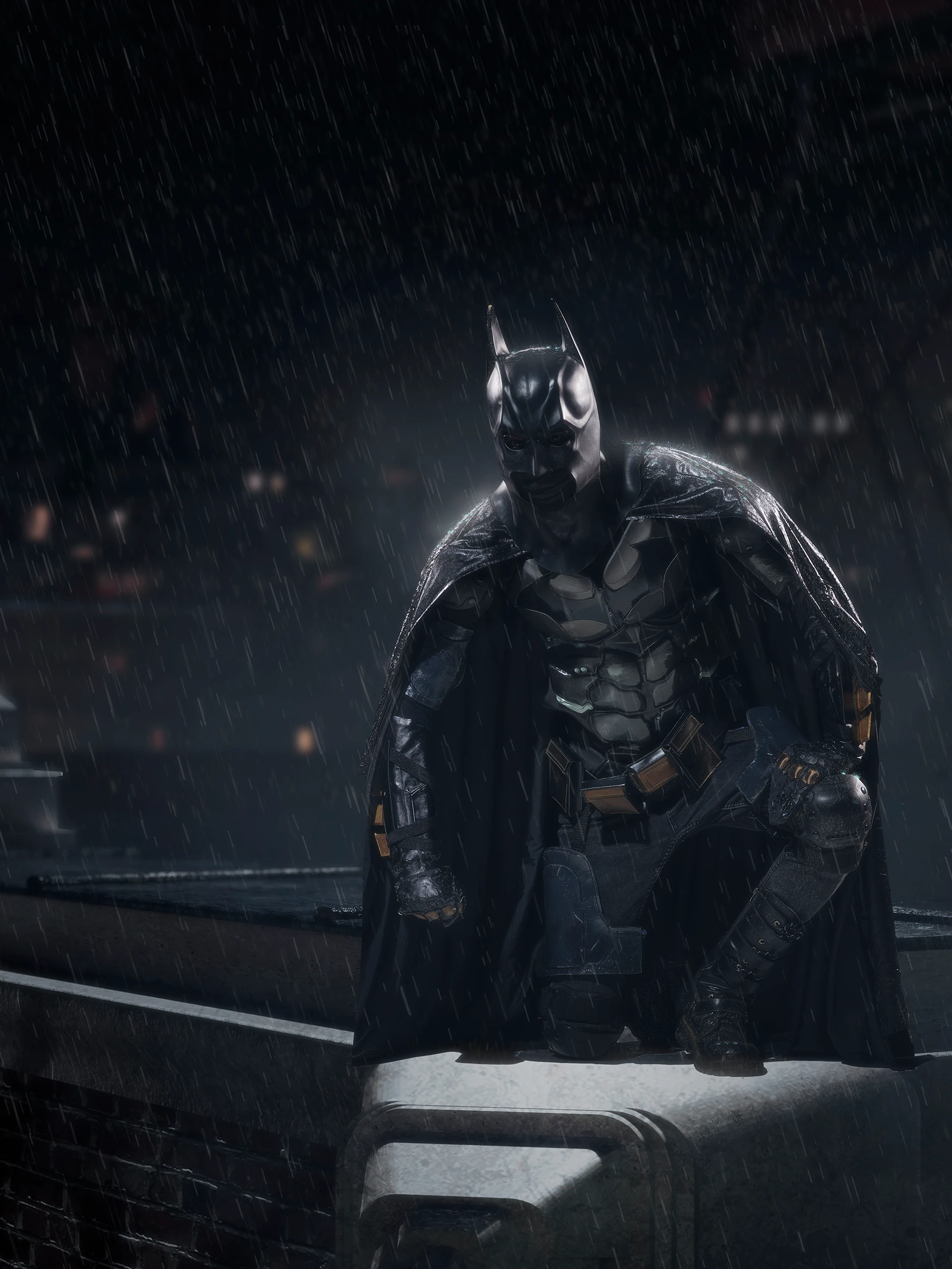 batman guarding the city in the rain